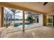 Spacious pool area with access from the home at 455 Park Trace Blvd, Osprey, FL 34229