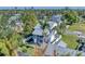 Aerial view of a two-story house and surrounding neighborhood at 602 84Th Nw St, Bradenton, FL 34209