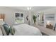 Peaceful bedroom with a king-size bed and mirrored closet at 602 84Th Nw St, Bradenton, FL 34209