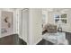 Bright hallway with dark hardwood floors and linen closet at 602 84Th Nw St, Bradenton, FL 34209