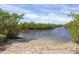 Sandy shore access to a calm waterway in Robinson Preserve at 602 84Th Nw St, Bradenton, FL 34209