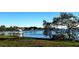 Relaxing waterfront view with a boat lift and calm water at 602 84Th Nw St, Bradenton, FL 34209