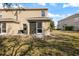 The backyard features a screened porch and a view to the adjacent home at 14847 Skip Jack Loop, Lakewood Ranch, FL 34202