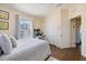 Bedroom features neutral walls, wood floors, and a closet at 14847 Skip Jack Loop, Lakewood Ranch, FL 34202