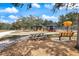 Community playground featuring swings, slides, and seating areas for families to enjoy at 14847 Skip Jack Loop, Lakewood Ranch, FL 34202