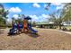 Colorful playground equipment at the park with a nearby picnic pavilion, perfect for outdoor play at 14847 Skip Jack Loop, Lakewood Ranch, FL 34202