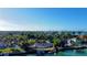 Waterfront property with large lot and surrounding homes at 109 N Warbler Ln, Sarasota, FL 34236