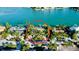 Empty lot on waterfront, surrounded by luxury homes at 109 N Warbler Ln, Sarasota, FL 34236