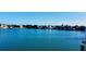Aerial view of waterfront homes and blue water at 109 N Warbler Ln, Sarasota, FL 34236