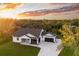Luxury home with a large backyard, screened patio, and paver driveway at 2129 Lorraine Dr, Port Charlotte, FL 33953