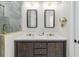 Modern bathroom with double vanity and gold accents at 2129 Lorraine Dr, Port Charlotte, FL 33953
