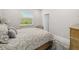 Bright bedroom with a queen-size bed and large window at 2129 Lorraine Dr, Port Charlotte, FL 33953