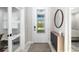 Light and airy entryway with a stylish mirror and console table at 2129 Lorraine Dr, Port Charlotte, FL 33953
