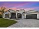 Modern single story home with screened porch and paver driveway at 2129 Lorraine Dr, Port Charlotte, FL 33953