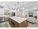 Modern kitchen with large island and stainless steel appliances at 2129 Lorraine Dr, Port Charlotte, FL 33953