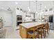 Open concept kitchen with island and stainless steel appliances at 2129 Lorraine Dr, Port Charlotte, FL 33953