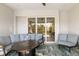 Covered patio with seating area and fire pit, perfect for relaxing at 2129 Lorraine Dr, Port Charlotte, FL 33953
