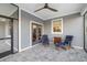 Relaxing screened-in patio with comfortable seating at 2129 Lorraine Dr, Port Charlotte, FL 33953