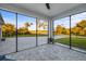 Spacious screened patio overlooking the backyard at 2129 Lorraine Dr, Port Charlotte, FL 33953