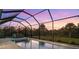 Relaxing pool and spa area with sunset views at 2129 Lorraine Dr, Port Charlotte, FL 33953