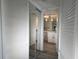 Bright bathroom featuring a vanity with marble countertop, toilet and walk in shower at 3993 Lake Bayshore Dr # F513, Bradenton, FL 34205