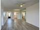 Great open living room and kitchen layout with light hard wood floor at 3993 Lake Bayshore Dr # F513, Bradenton, FL 34205