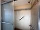Tiled shower with glass sliding doors and safety bar at 3993 Lake Bayshore Dr # F513, Bradenton, FL 34205