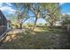 View of backyard with mature trees at 611 Mobile Rd, Venice, FL 34293