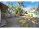 This backyard features a wood fence and plenty of open space at 611 Mobile Rd, Venice, FL 34293