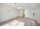 Spacious bedroom features wood floors, ceiling fan, closet, and a window for natural light at 611 Mobile Rd, Venice, FL 34293
