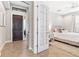 Spacious bedroom with entry and built-in shelving at 655 Resolute St, Nokomis, FL 34275