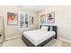 Cozy bedroom with a double bed and wall art at 655 Resolute St, Nokomis, FL 34275