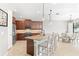 Updated kitchen featuring granite island and stainless steel appliances at 655 Resolute St, Nokomis, FL 34275
