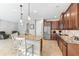 Modern kitchen with granite island and stainless steel appliances at 655 Resolute St, Nokomis, FL 34275