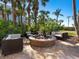 Relaxing fire pit area with comfortable seating at 915 Seaside Dr # 407, Sarasota, FL 34242
