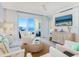 Living Room with ocean view and comfy seating at 915 Seaside Dr # 407, Sarasota, FL 34242