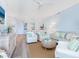 Open living area featuring light flooring and neutral tones at 915 Seaside Dr # 407, Sarasota, FL 34242