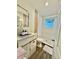 Clean bathroom with a shower, toilet and modern vanity at 1127 41St St, Sarasota, FL 34234