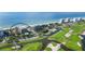 Aerial view of beachfront property near golf course at 535 Sanctuary Dr # A202, Longboat Key, FL 34228