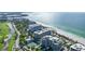 Aerial view of the condo building and its surroundings at 535 Sanctuary Dr # A202, Longboat Key, FL 34228