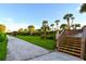 Steps lead from paved path to beach access boardwalk at 535 Sanctuary Dr # A202, Longboat Key, FL 34228