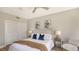 Bedroom with king-size bed, and neutral color palette at 535 Sanctuary Dr # A202, Longboat Key, FL 34228