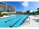 Large swimming pool with multiple lap lanes at 535 Sanctuary Dr # A202, Longboat Key, FL 34228