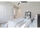 Cozy bedroom with light walls, and an ensuite bathroom at 8332 Sea Glass Ct, Sarasota, FL 34240