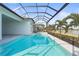 Enclosed pool and spa with lake view at 8332 Sea Glass Ct, Sarasota, FL 34240