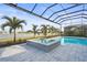 Enclosed spa and pool with lake view at 8332 Sea Glass Ct, Sarasota, FL 34240