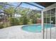 Inviting screened-in pool area with a spacious patio at 2204 51St E Blvd, Bradenton, FL 34208