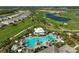 Resort-style pool and clubhouse with surrounding golf course at 4734 Tortona Ct, Bradenton, FL 34211
