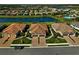 Three homes with tile roofs and garages at 4734 Tortona Ct, Bradenton, FL 34211