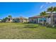 Two homes with screened patios and grassy backyard at 4734 Tortona Ct, Bradenton, FL 34211